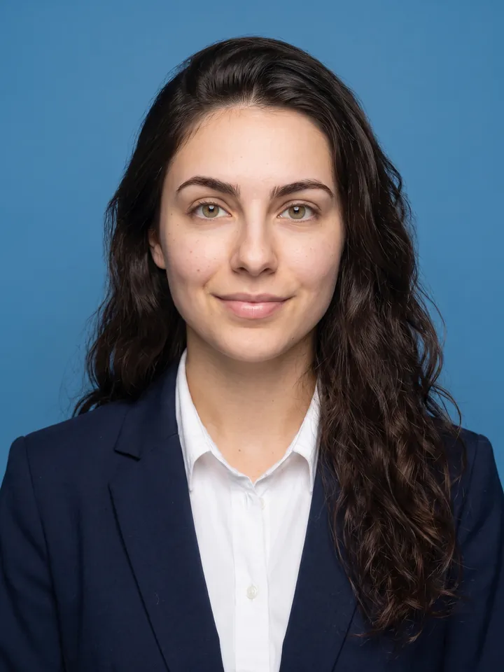 ID photo on a blue background in business attire