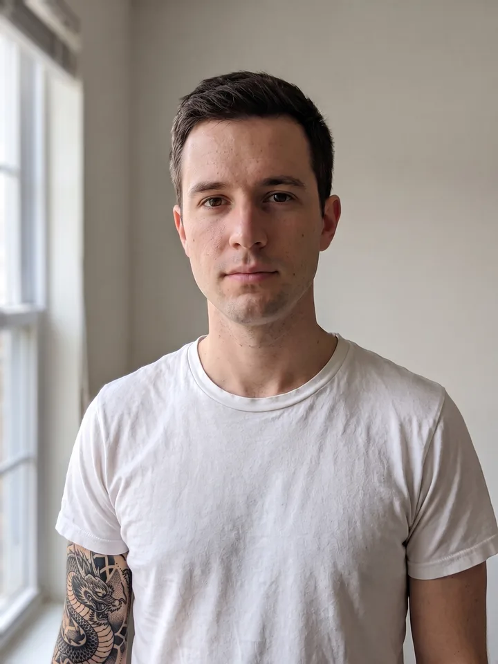 The male reference photo with a tattoo added to the skin