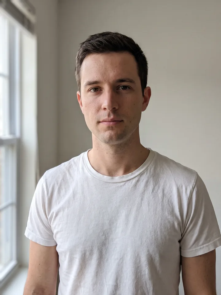 The male source photo: a neutral portrait used as the input of every scenario